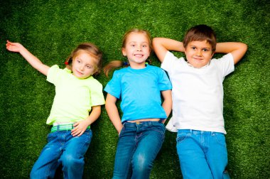 Kids on grass clipart