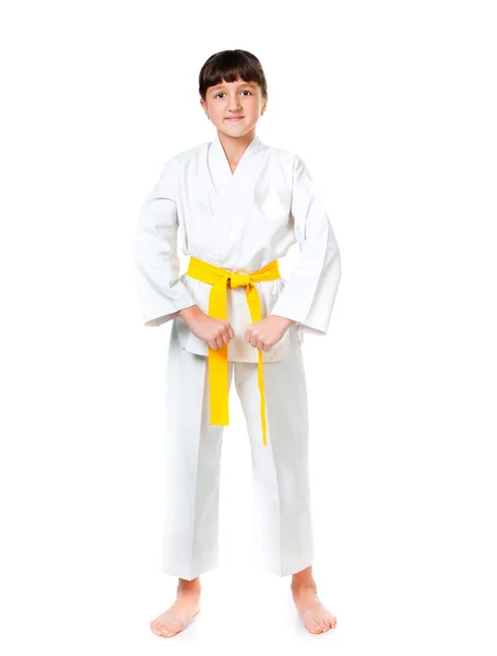 Kleines Mädchen im Kimono mit gelber Schärpe — Stockfoto