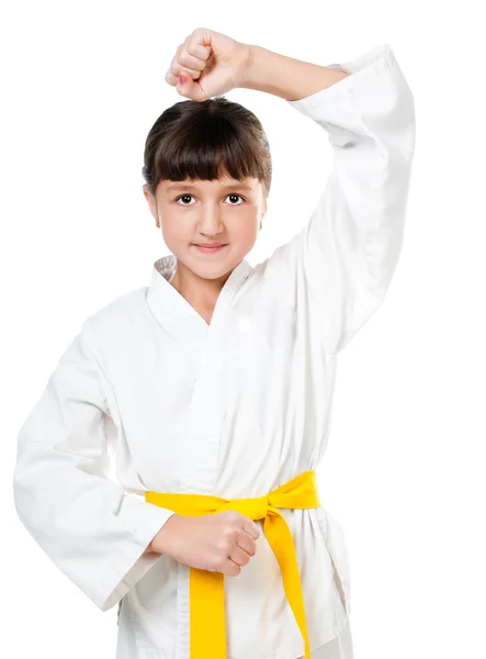 Little girl in a kimono with a yellow sash — Stock Photo, Image
