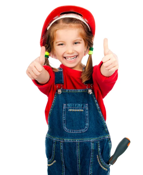 Chica en el casco de construcción con un pulgar hacia arriba —  Fotos de Stock