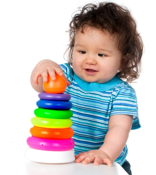 Klein kind met speelgoed — Stockfoto