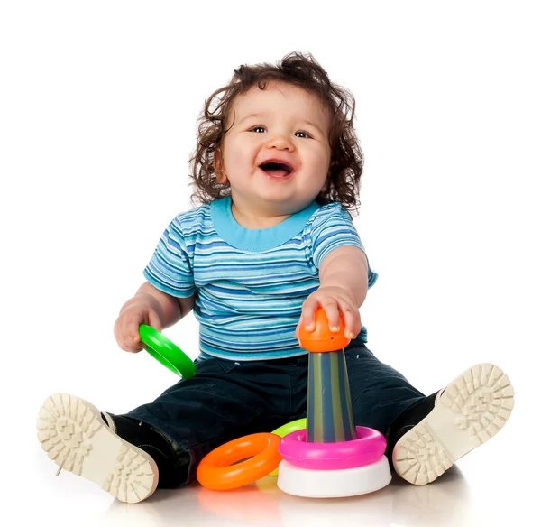 Klein kind met speelgoed — Stockfoto