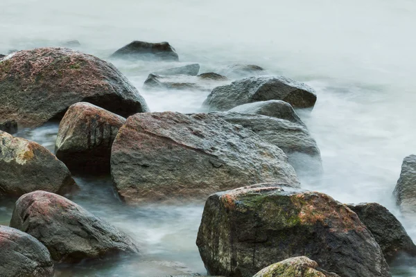 stock image Steine im Meer