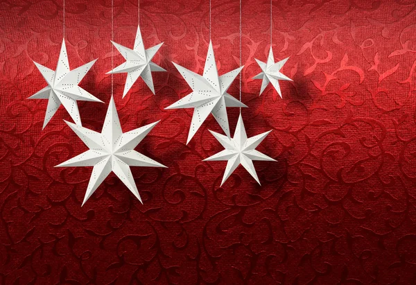 白色纸星星上红色织锦 — 图库照片
