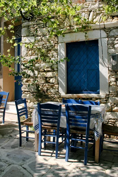 Greek outdoor tavern table — Stock Photo, Image