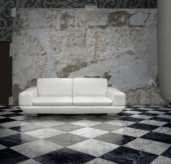 Grunge vägg vit soffa — Stockfoto