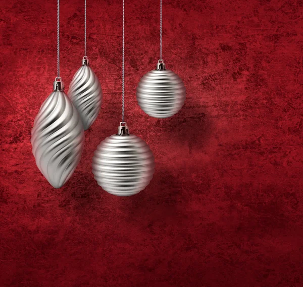 Silver christmas decoration on red — Stock Photo, Image