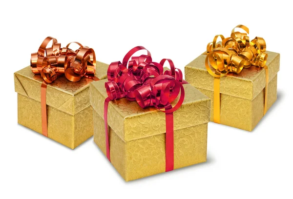 Üç altın hediye kutusu — Stok fotoğraf