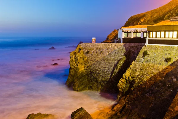 House on a cliff on sunset, Portugal. — Stock Photo, Image