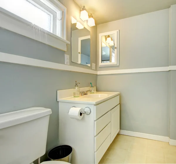 Grey bathroom with white simple cabinet. — Stock Photo, Image