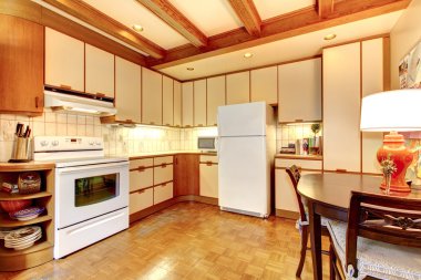 Old simple white and wood kitchen interior. clipart