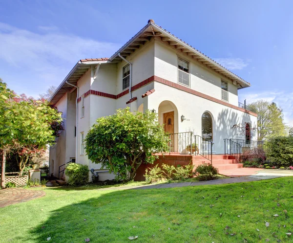 stock image Spanish style white large home front exterior.