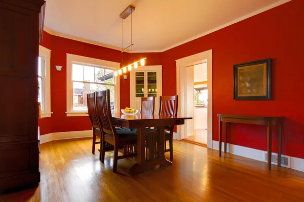 Classic red dining room with antique furniture — Stock Photo, Image