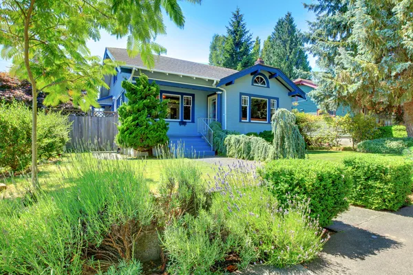 Small old cute blue craftsman one level home. — Stock Photo, Image
