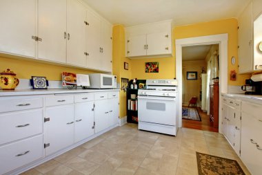 Old white English kitchen interior. clipart