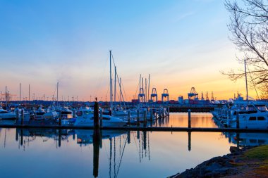 Tacoma port and marina with boats at sunset. clipart