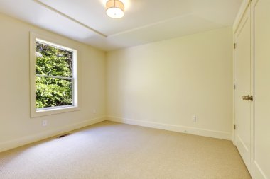 Empty beige new bedroom interior. clipart