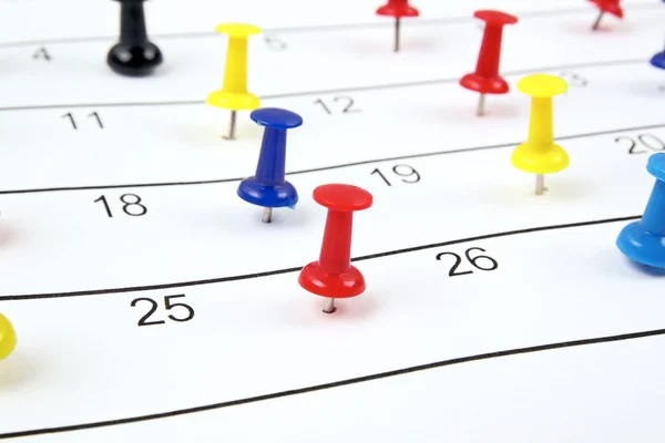 Calendar with pushpins — Stock Photo, Image