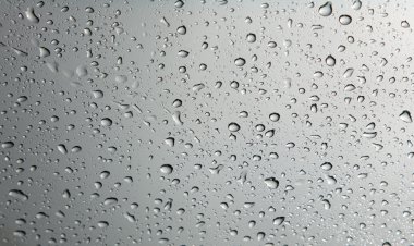 Background of Rain drops on Glass clipart