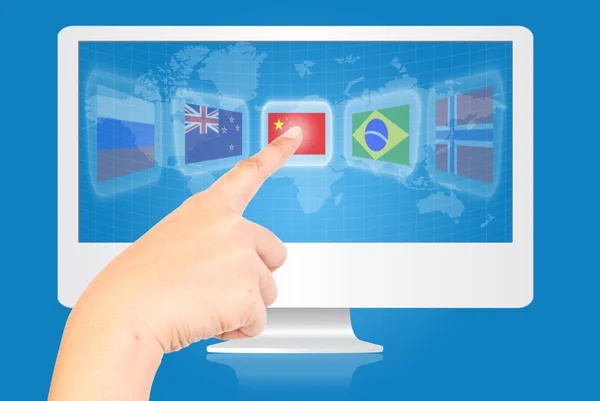 Hand pushing flag on the monitor screen. — Stock Photo, Image