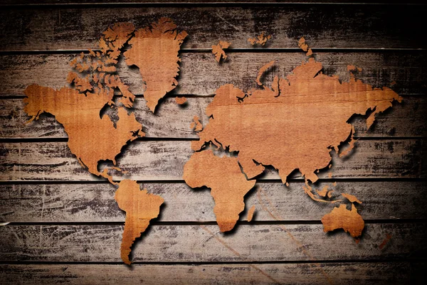 Mapa historických světa carving na texturu dřeva. — Stock fotografie