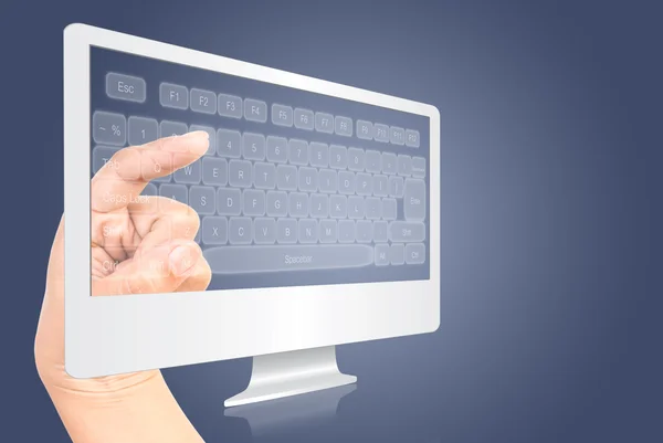 Ruka se dotýká klávesnice na izolát obrazovky monitoru na bílé. — Stock fotografie