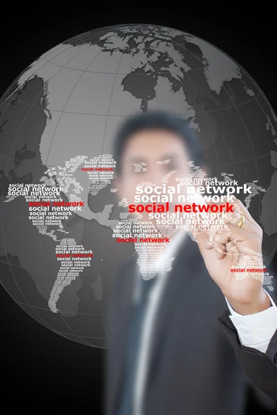 Geschäftsmann schreibt Welt der sozialen Netzwerke. — Stockfoto