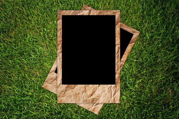 Ročníku foto rámeček na pozadí textury trávy. — Stock fotografie