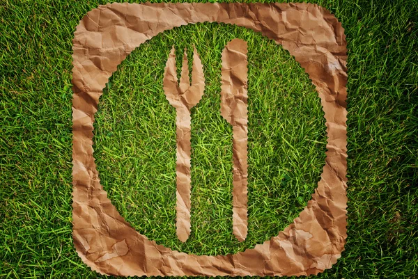 Símbolo de restaurante vintage en el fondo de textura de hierba . —  Fotos de Stock