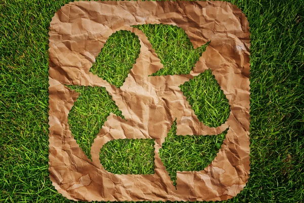 Vintage recycle symbol on the grass field. — Stock Photo, Image