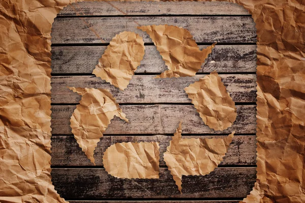 Vintage recycle symbol on the wood texture. — Stock Photo, Image