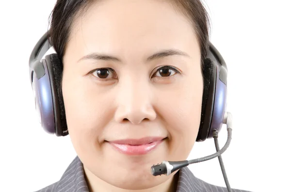 Zakelijke dame call centrum medewerker spreken over de headset geïsoleerd. — Stockfoto
