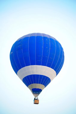 Hot air balloon on the sky. clipart