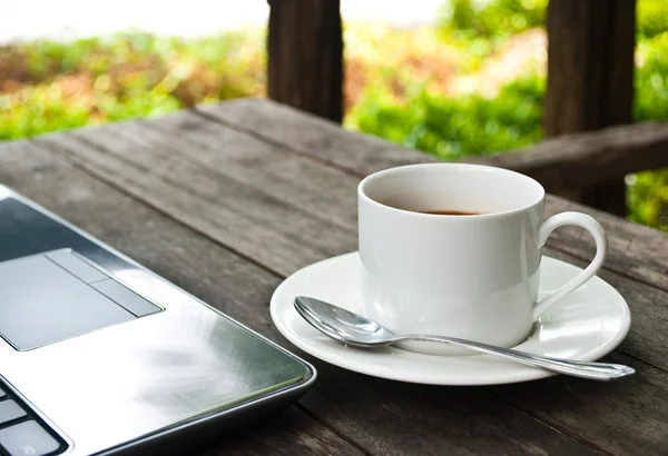 Coffee cup and laptop for business. — Stock Photo, Image