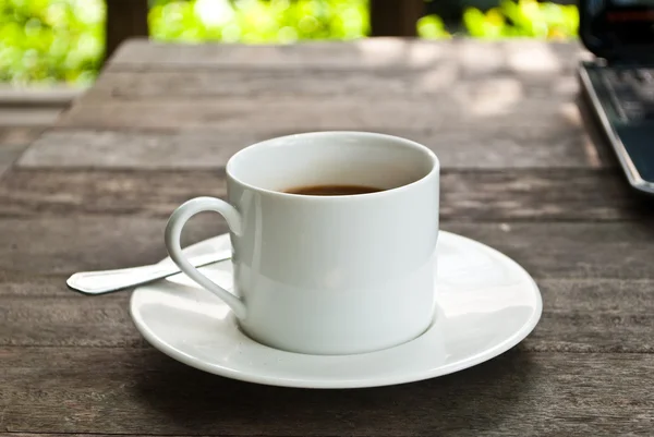 Tasse à café sur la texture du bois . — Photo