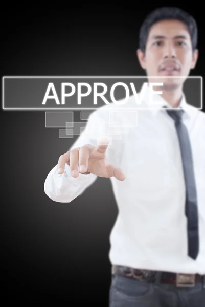 Businessman pushing Approve word on a touch screen interface. — Stock Photo, Image