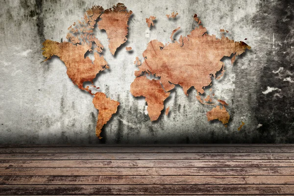 Vintage world map carving on wall texture. — Stock Photo, Image