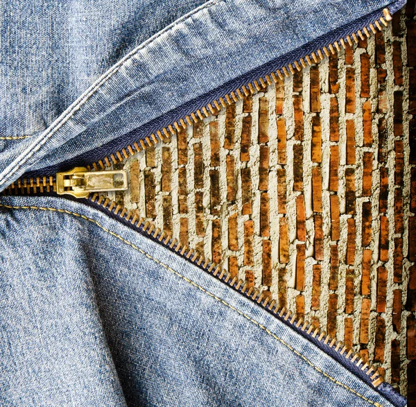 Close up of zipper with grunge wall in blue denim. — Stock Photo, Image