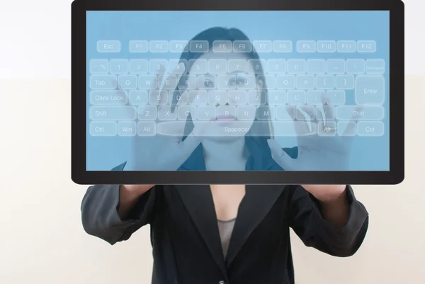 Business lady pushing keyboard button on tablet screen. — Stock Photo, Image