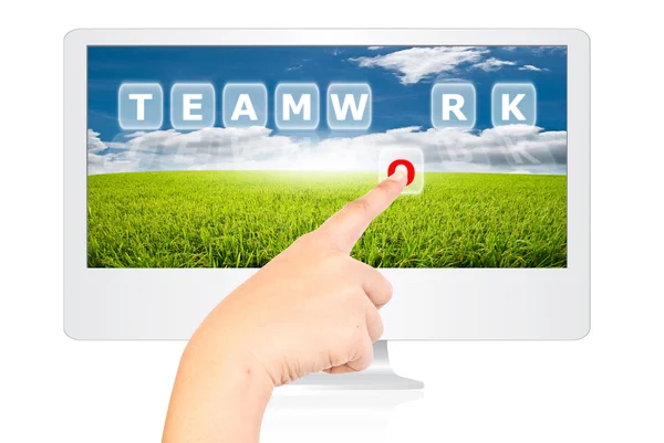 Hand pushing Teamwork word on monitor screen. — Stock Photo, Image