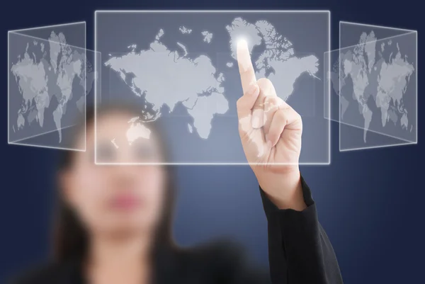 Business lady pushing Social Network world map. Stock Picture