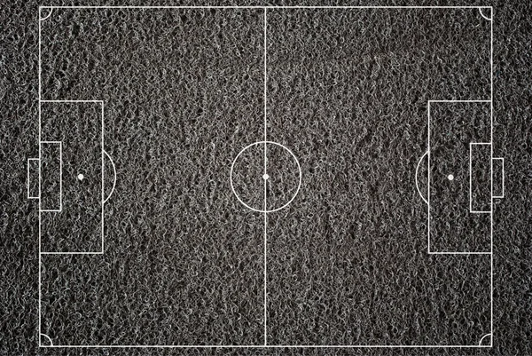 Voetbal veld textuur met oude tapijt. — Stockfoto