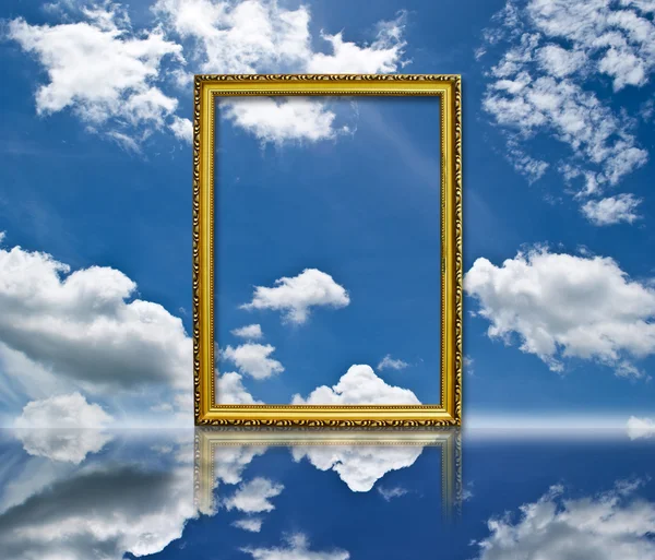Photo frame on the blue sky field. — Stock Photo, Image