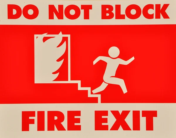 Blockera inte brand exit tecken — Stockfoto