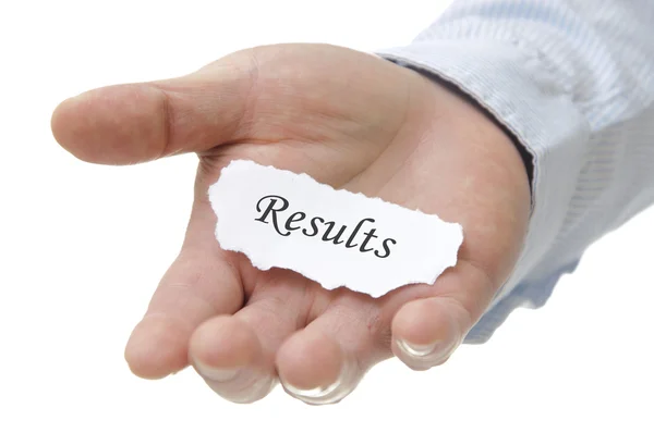 Businessman holding results note — Stock Photo, Image
