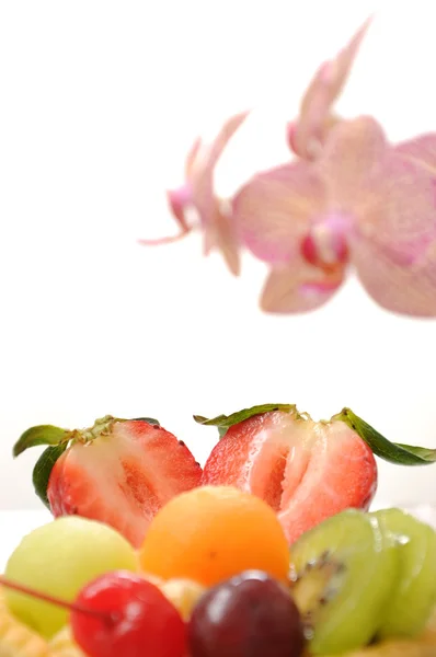 Frukt tart och orkidé — Stockfoto