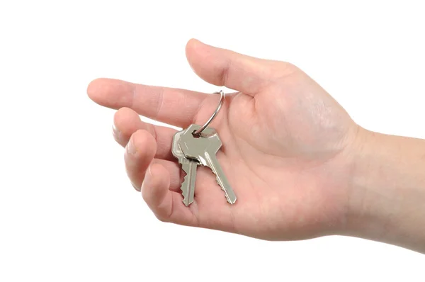 Business man holding key — Stock Photo, Image