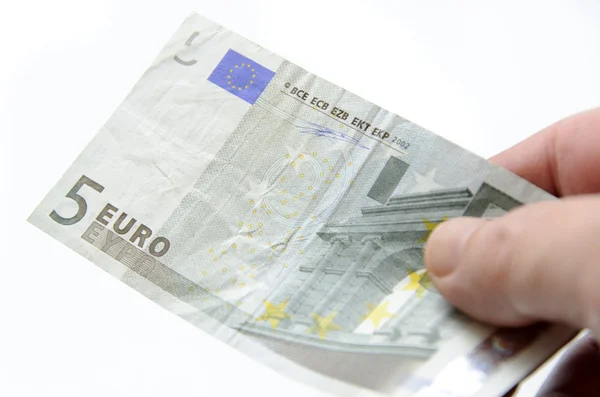Handing five dollar euro bill — Stock Photo, Image