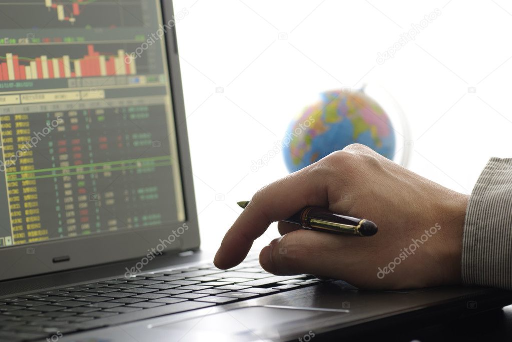 Business man checking stock diagram