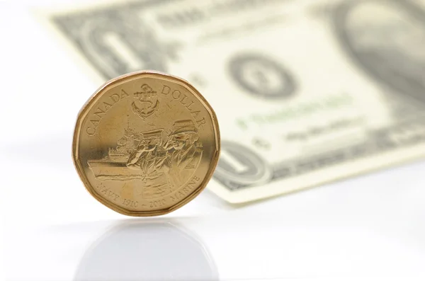 One dollar differ between US and Canadian money — Stock Photo, Image